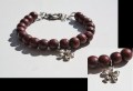 Armband houten kralen met bloem bedel